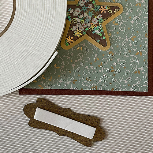 Voorplat met schutster en gouden rand